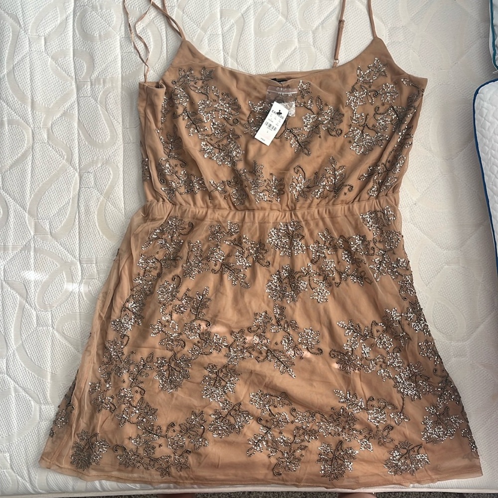 Nude dress with copper sequins floral design